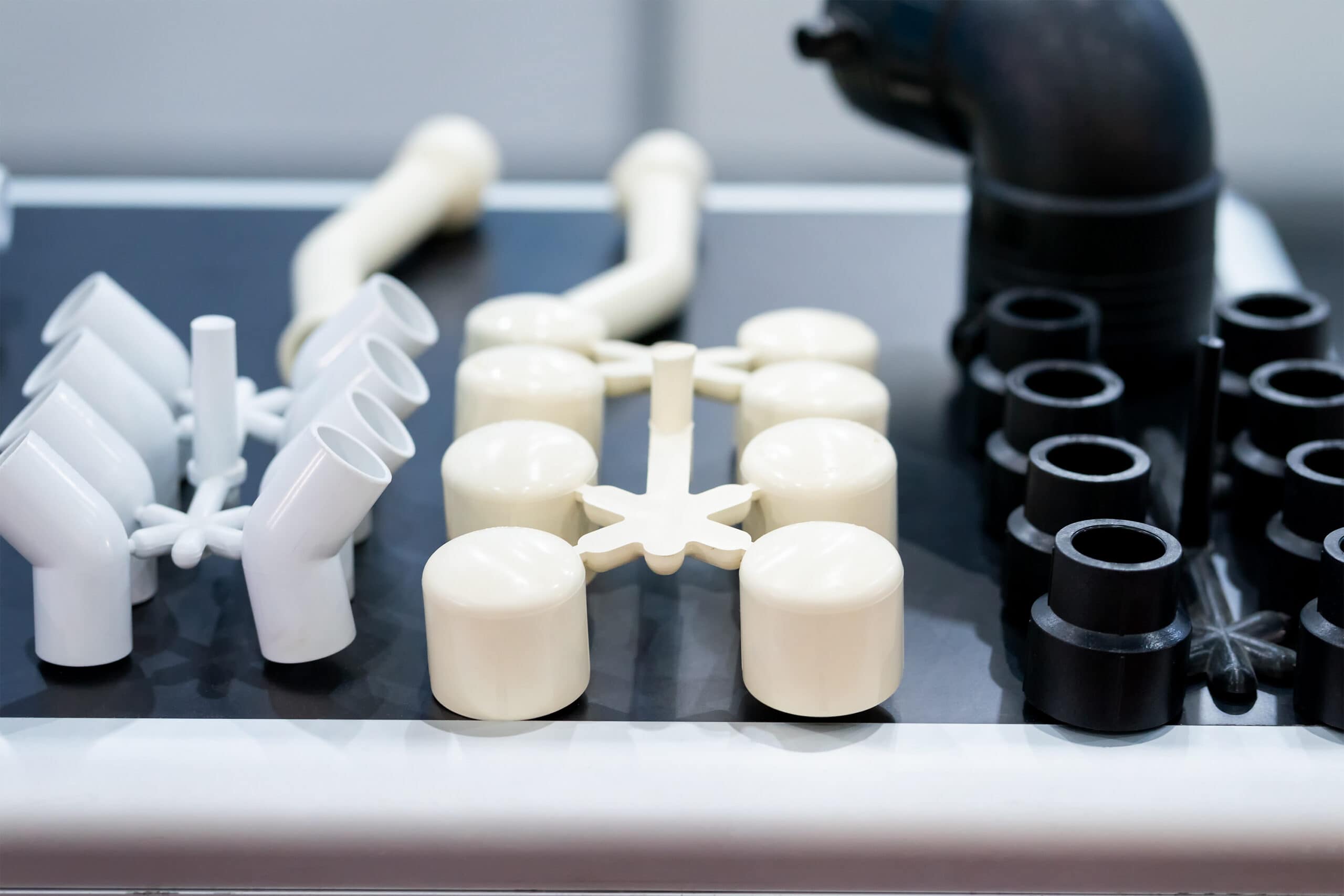 High-performance plastic molded parts reference image for injection molding material selection.